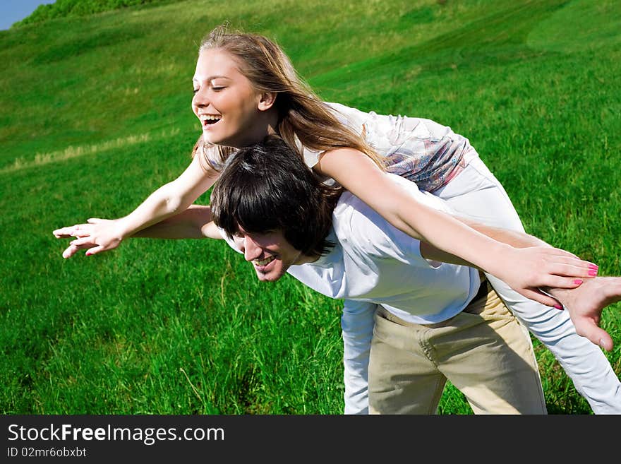 Girl and boy on field