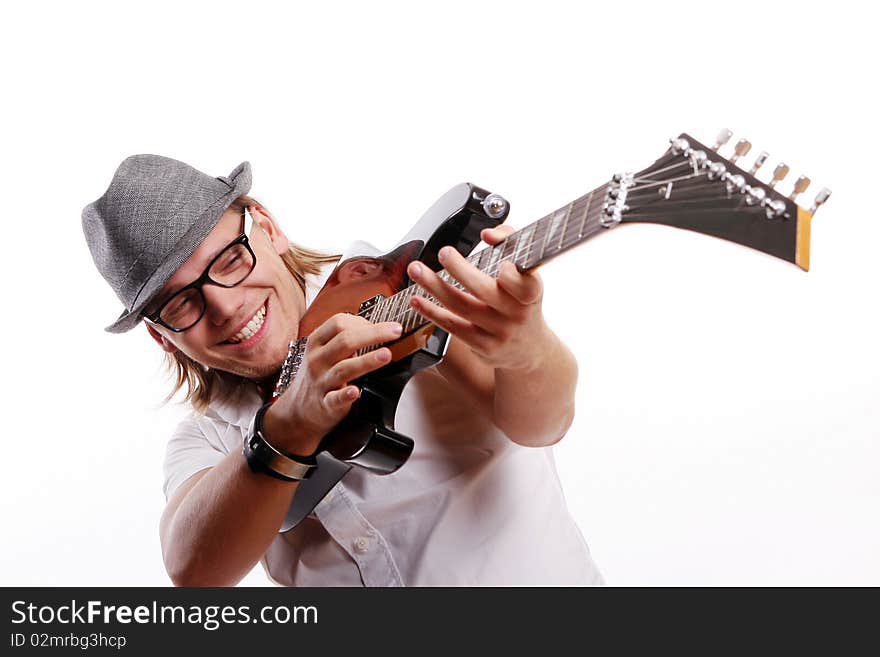 Happy young and attractive man with guitar