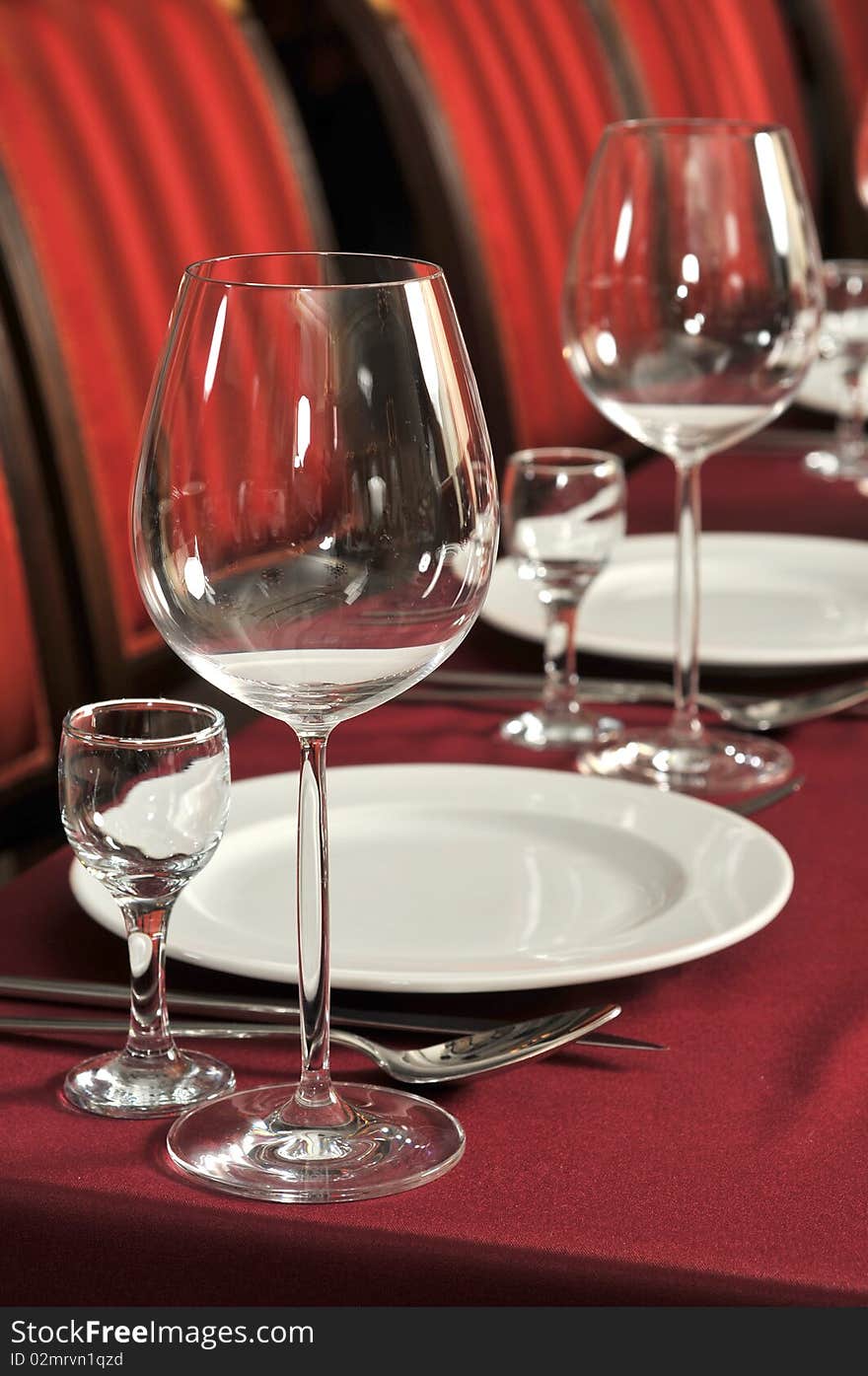 Wine glasses on a table at restaurant.