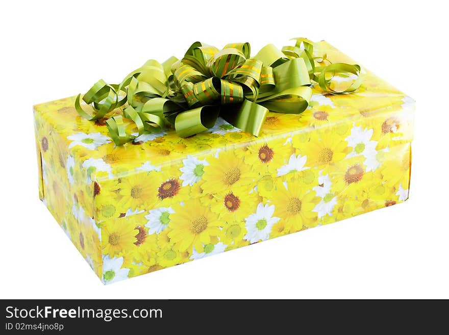 Gift wrapped with a green ribbon / isolated