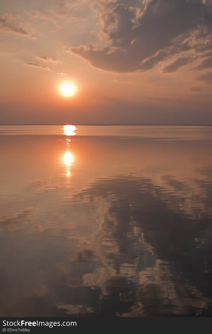 Sunset Reflects On The Calm Water Of Ubonrat Dam