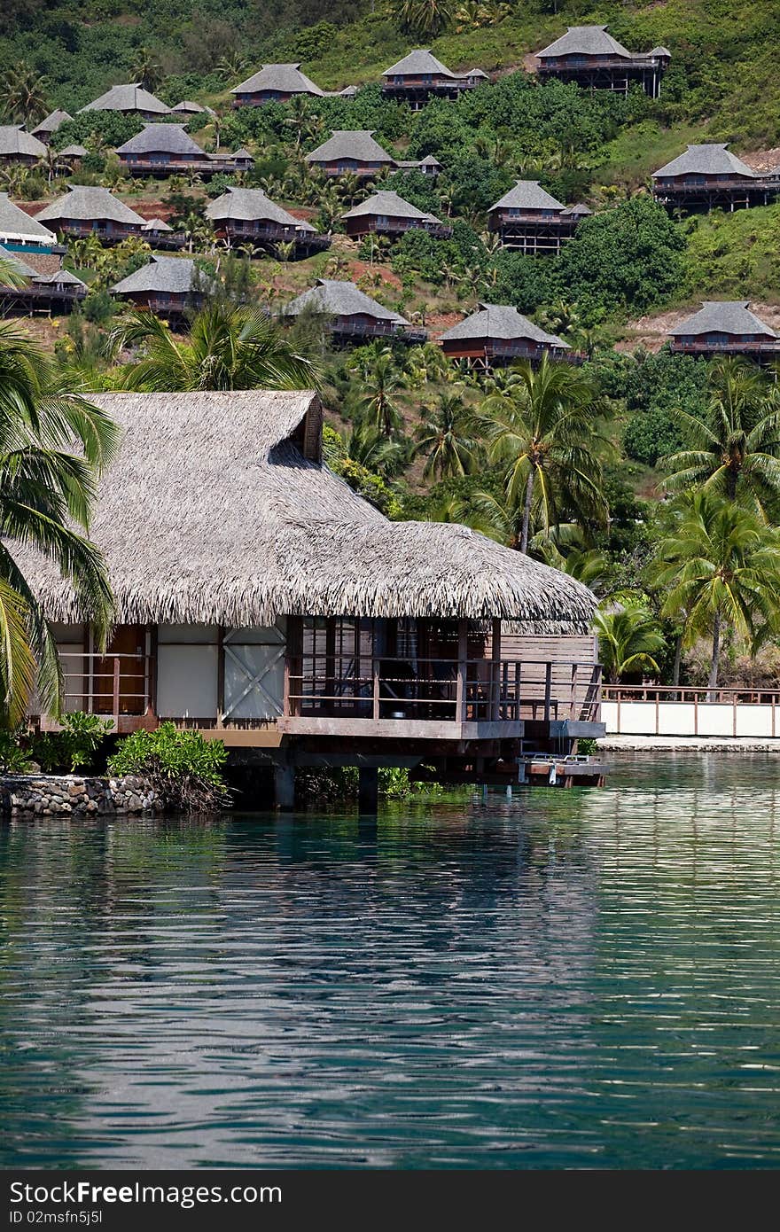 Water bungalows in the turquoise lagoon of Moorea, French Polynesia. Water bungalows in the turquoise lagoon of Moorea, French Polynesia.