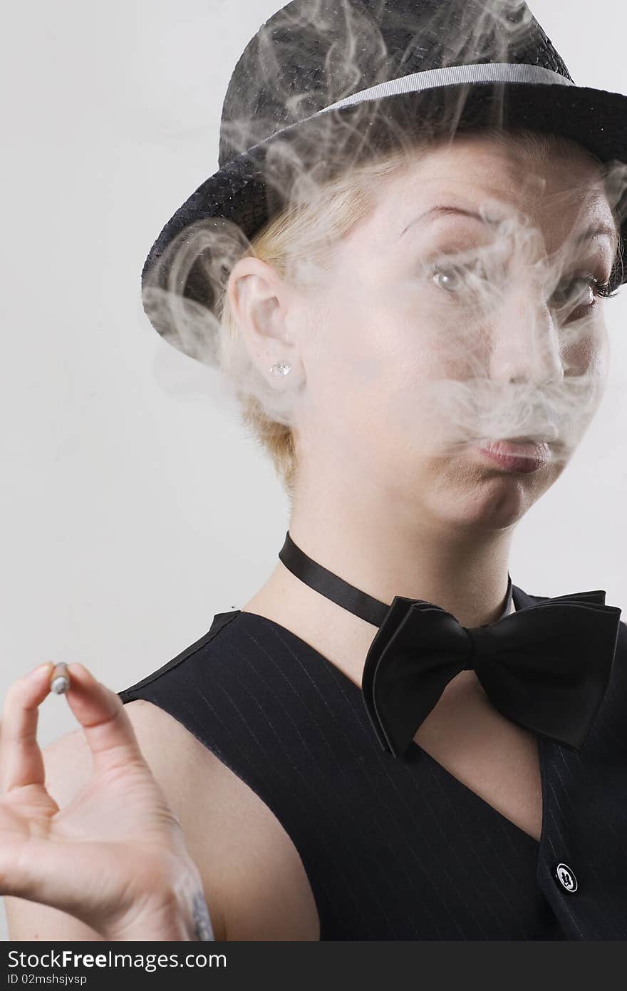 Young man smoking cigarette. Woman with painted moustache. Young man smoking cigarette. Woman with painted moustache