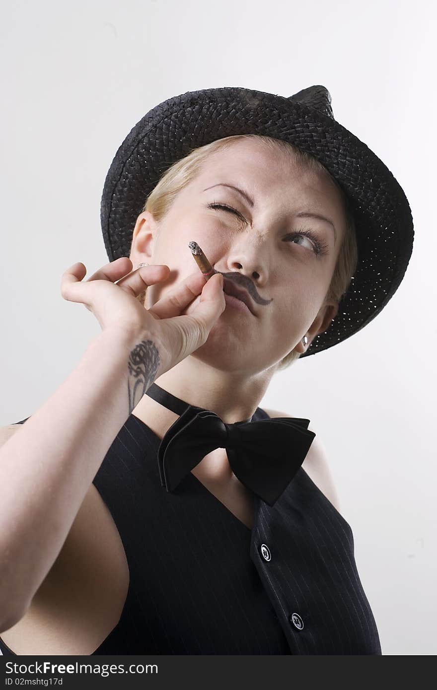 Young man smoking cigarette. Woman with painted moustache. Young man smoking cigarette. Woman with painted moustache