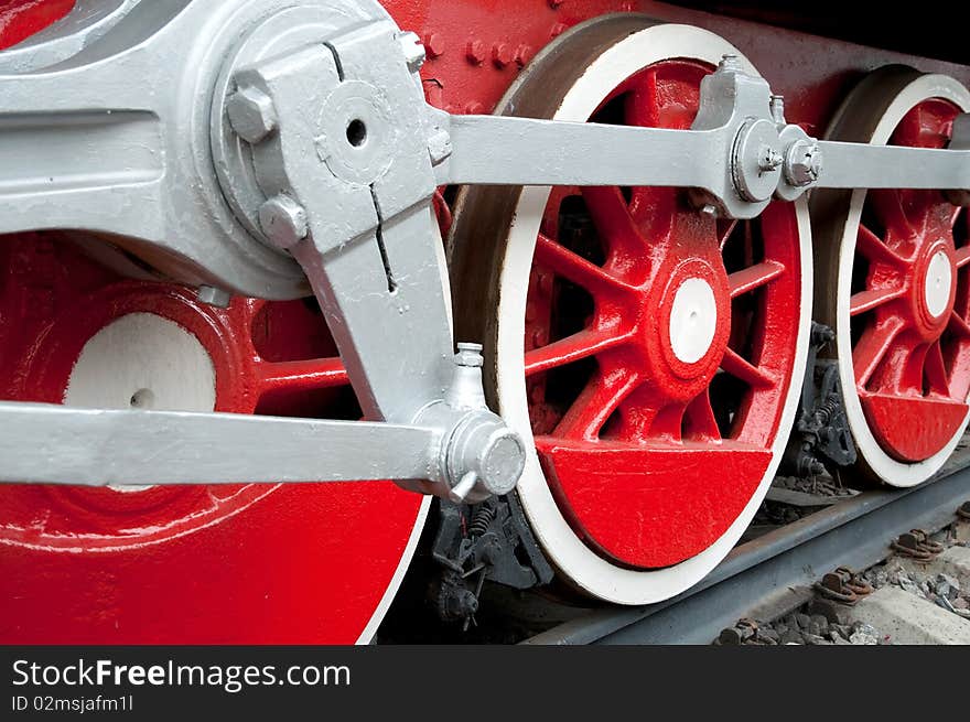 Old steam engine wheels close-up, horizontal