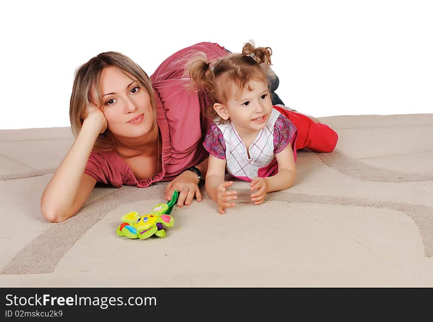 Young charming mother and her young daughter spent time together