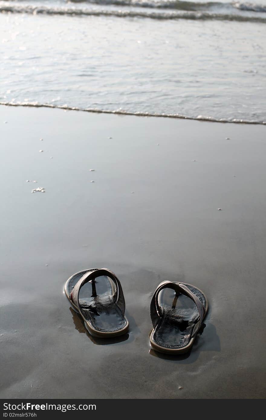 Sandals And Coastline