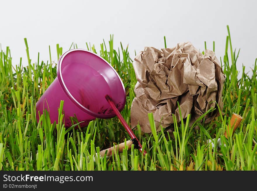 Thrown objects on a green grass. Thrown objects on a green grass.