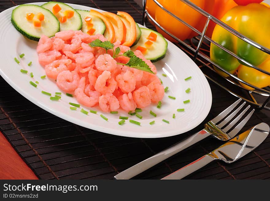 Prepared fresh shrimps with vegetables. Prepared fresh shrimps with vegetables.