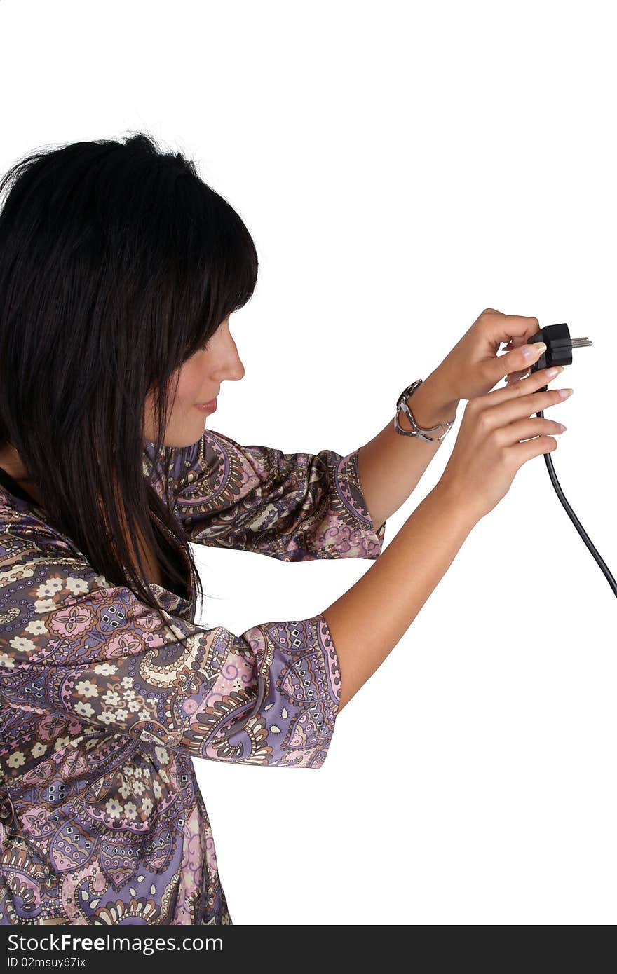 Woman plugging electric cord