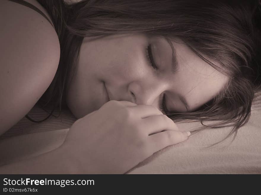 Young girl sleeping on a pillow. Young girl sleeping on a pillow