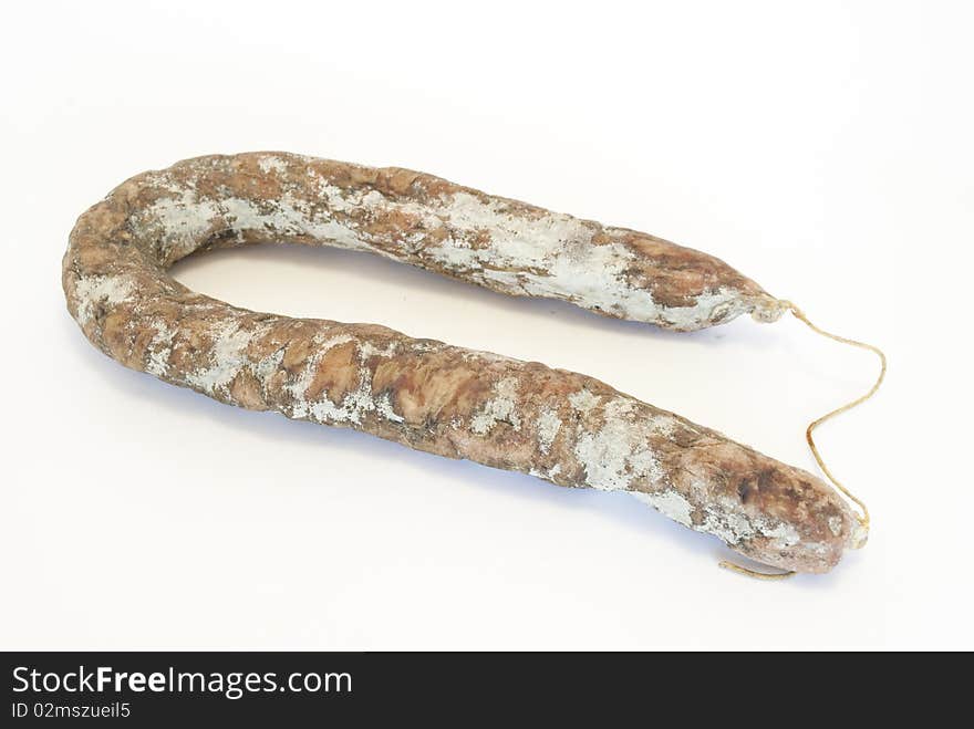 Italian type dry sausage isolated white background. Italian type dry sausage isolated white background