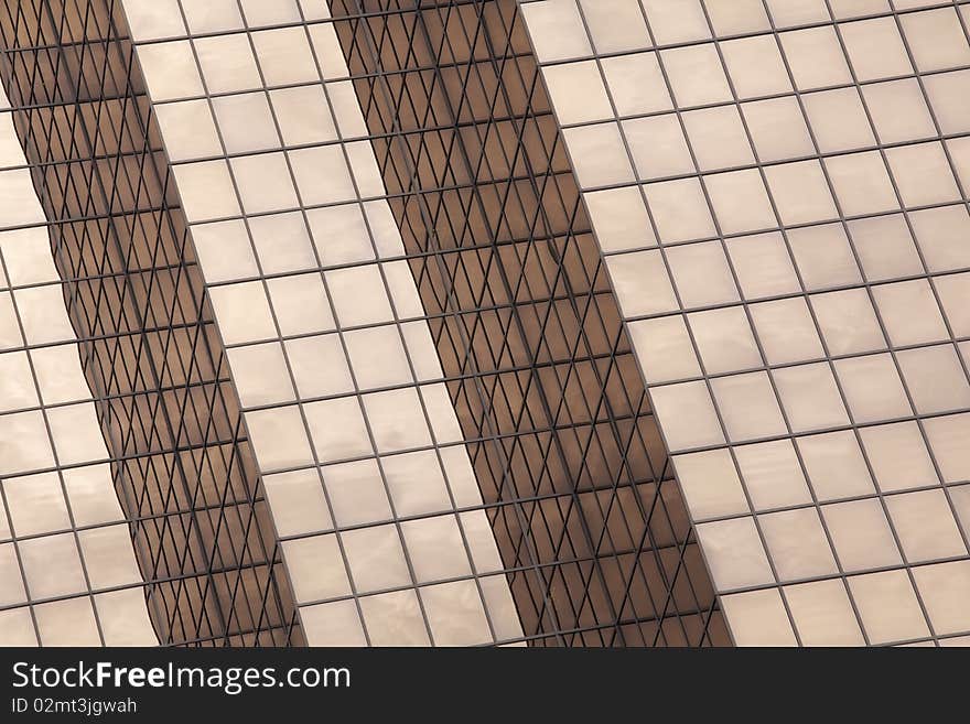 Abstract, looking up at a copper colored modern office building. Horizontal shot. Abstract, looking up at a copper colored modern office building. Horizontal shot.