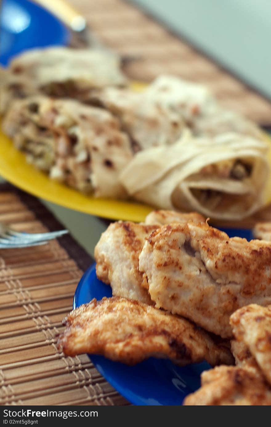 Fried chicken served with shawarma roll. Fried chicken served with shawarma roll