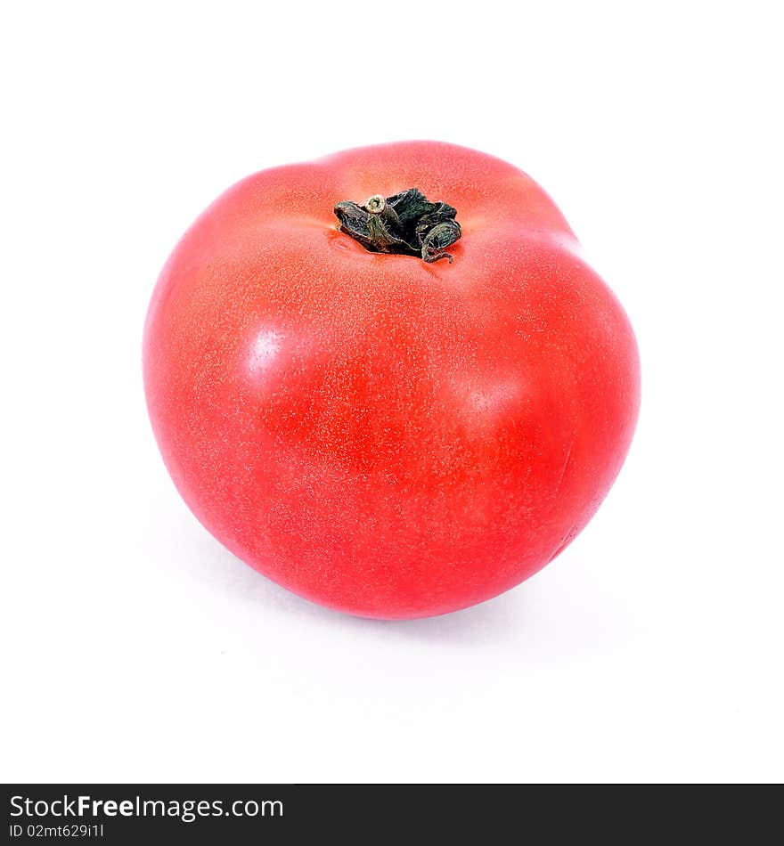 One red tomato isolated on white