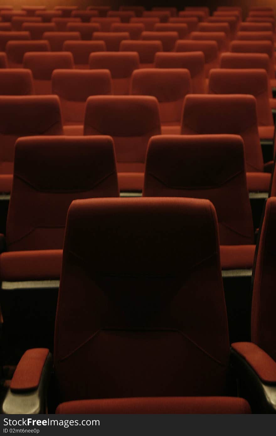 Empty red seats at cinema or theater. Empty red seats at cinema or theater