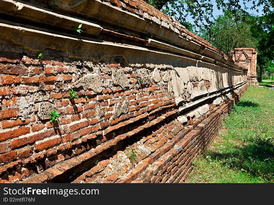 This ancient temple wall is in Ayutthaya, one of the most famous place to visit in Thailand