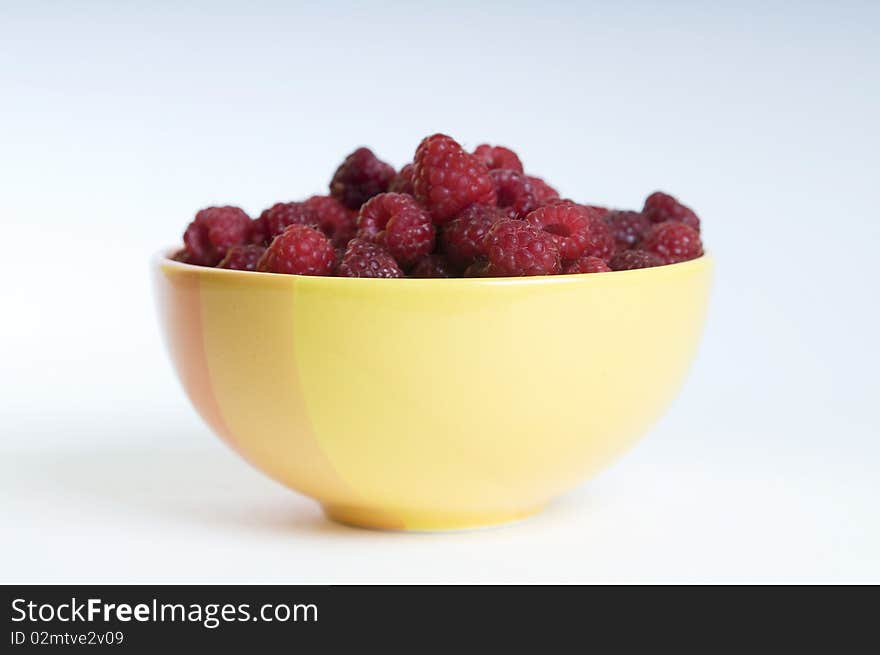 Plate with raspberries