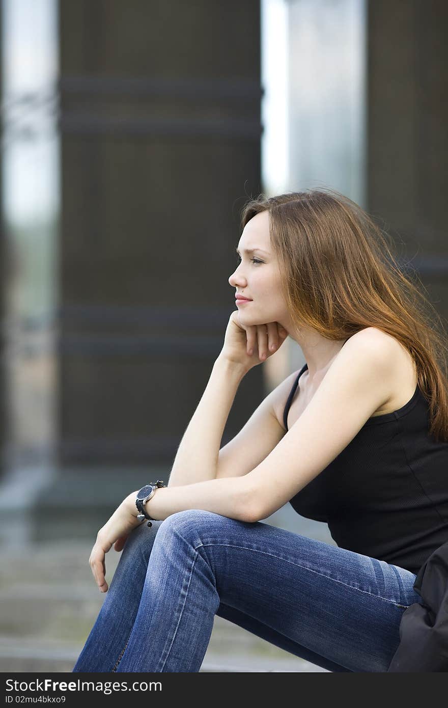 Woman Sit On Stair Look Forward