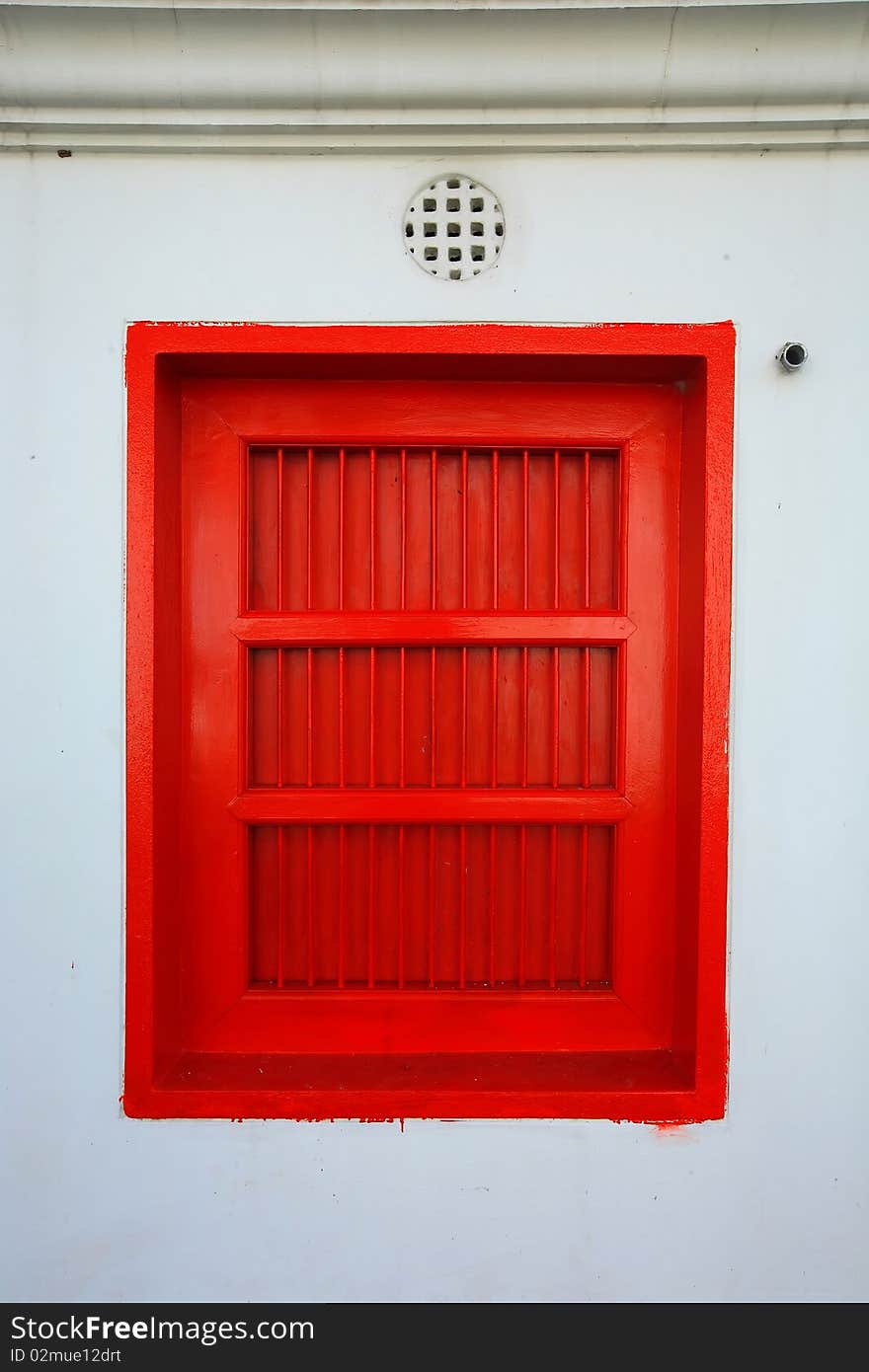 Old red window in Thailand temple