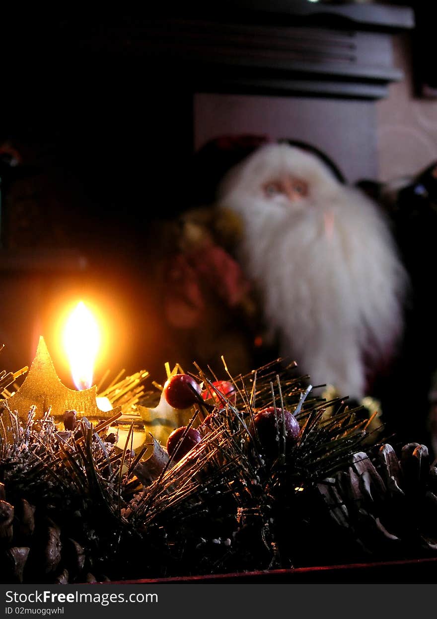 Flame burning in the centre of a christmas decoration. Flame burning in the centre of a christmas decoration