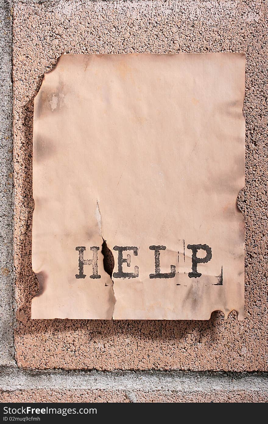 The announcement on a concrete wall with the request for the help. The announcement on a concrete wall with the request for the help.