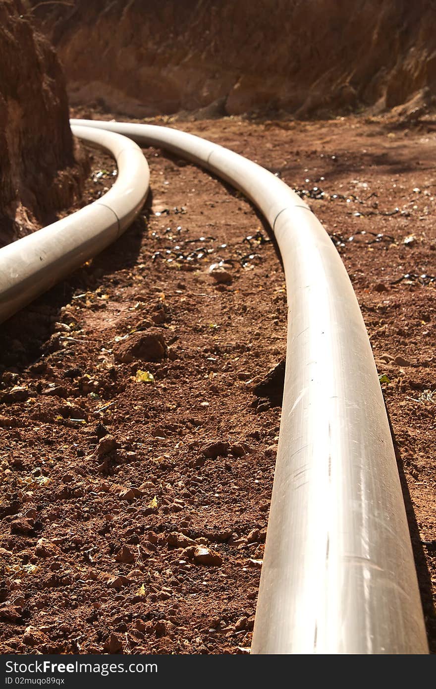 Pipes  synthetic  pipeline  laid in a trench from clay