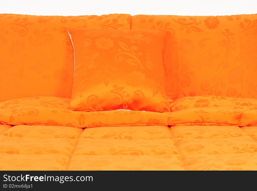 Orange bed spreads with soft pillows. Orange bed spreads with soft pillows.