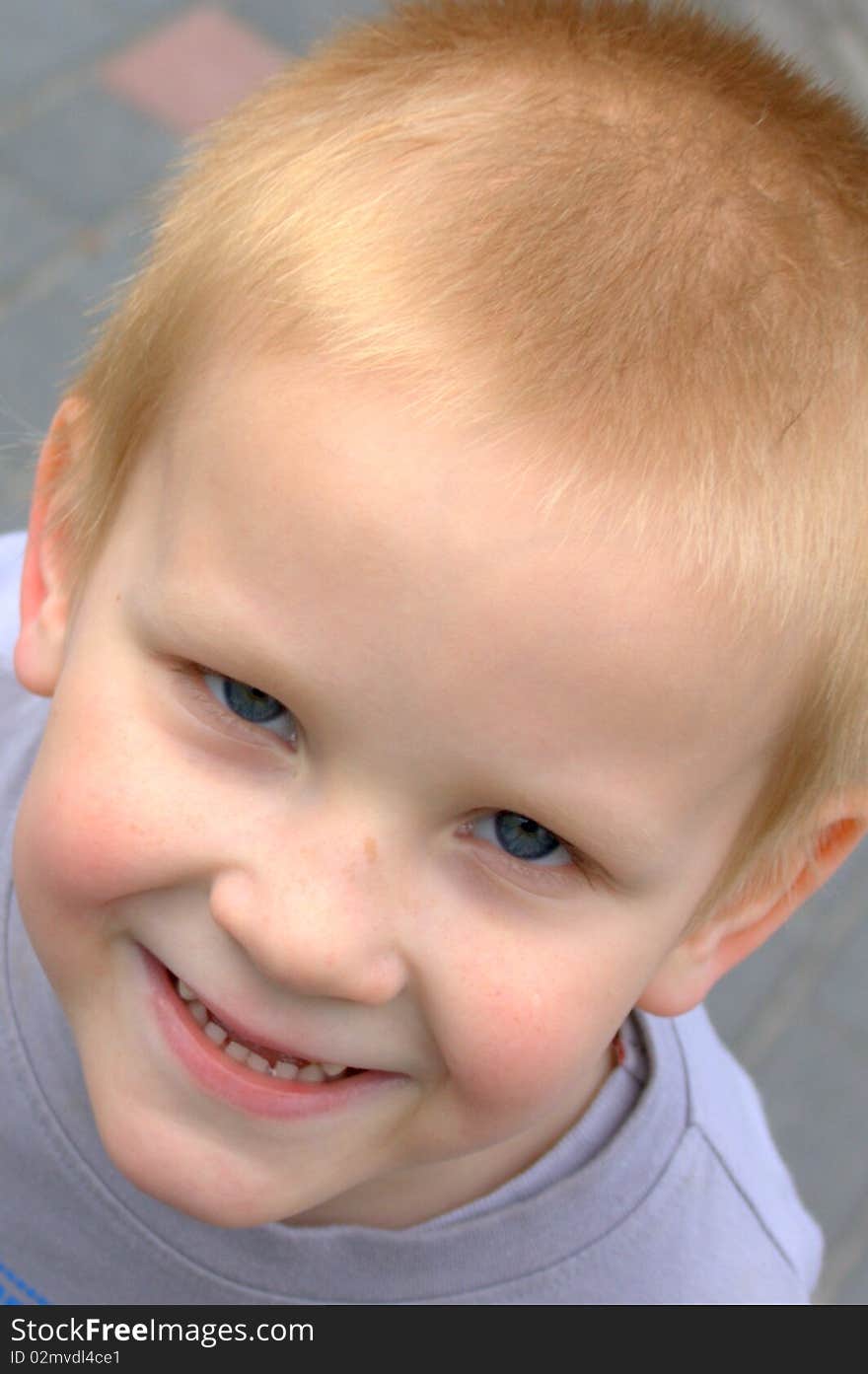 Little and sweet boy smiling