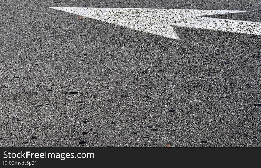 Arrow marking the lane traffic. Arrow marking the lane traffic