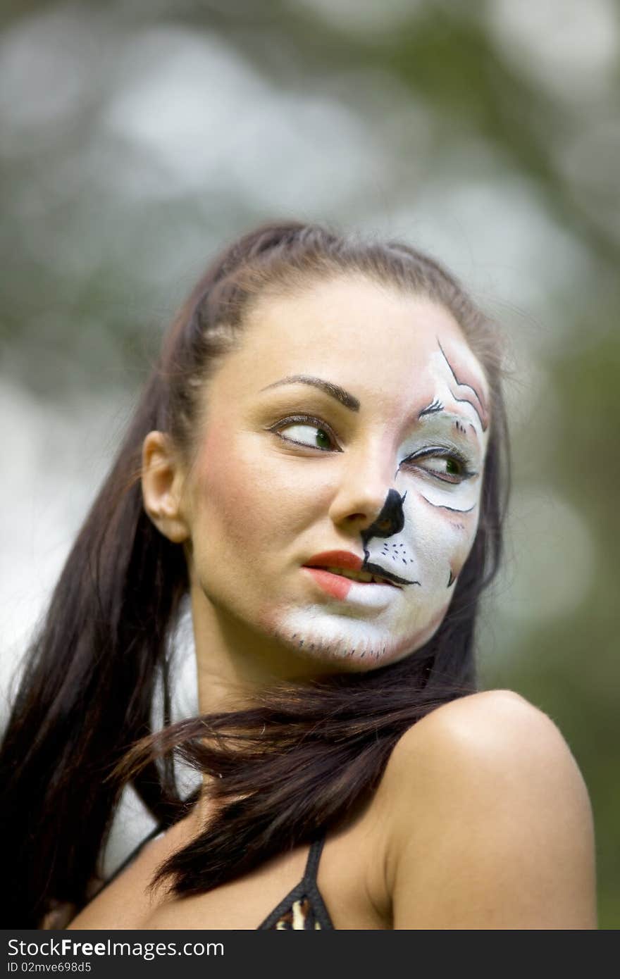 Woman with tigress face art portrait