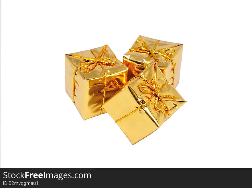 Heap of three isolated small yellow gifts. Heap of three isolated small yellow gifts