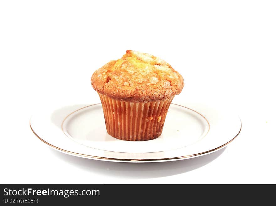 One muffins on white plate