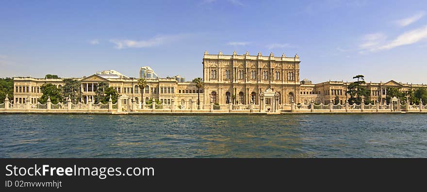 Large palace in Istanbul, Turkey on the edge of the Bosphorus river. Large palace in Istanbul, Turkey on the edge of the Bosphorus river