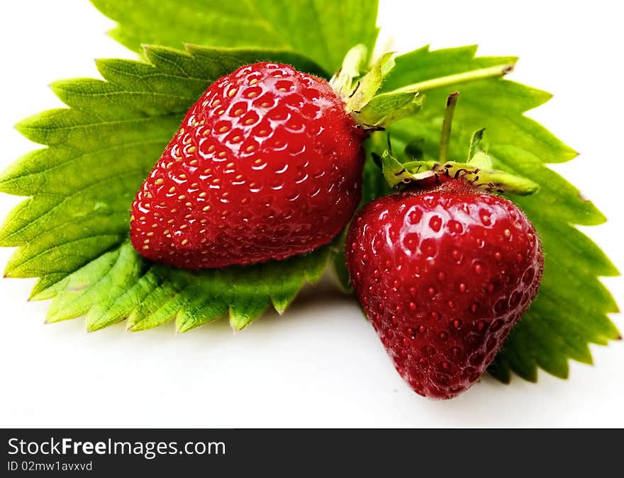 Isolated fruit - Strawberry on white background with leaves. Isolated fruit - Strawberry on white background with leaves