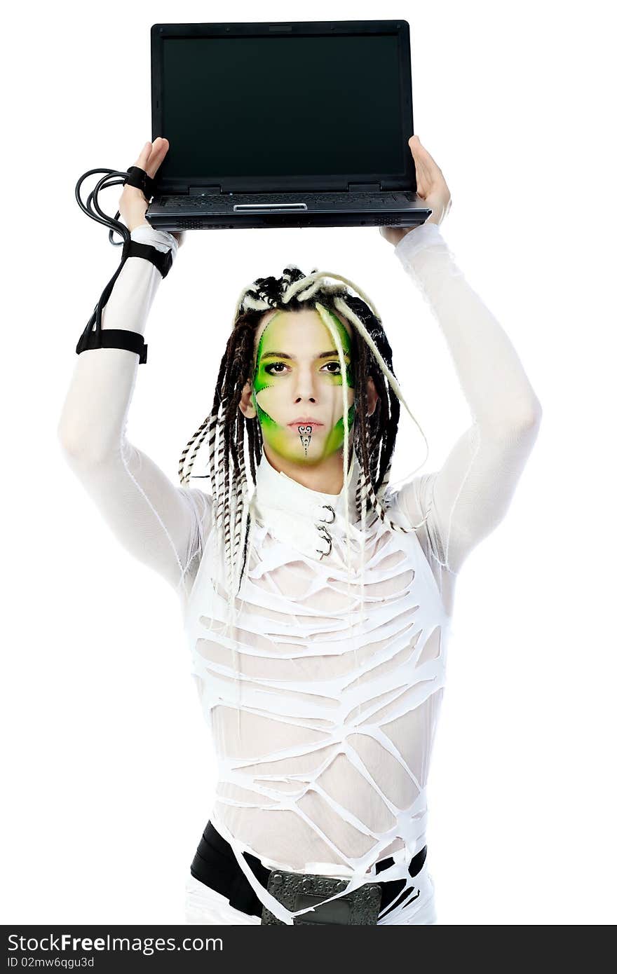 Shot of a futuristic young man with wires holding a laptop. Isolated over white background. Shot of a futuristic young man with wires holding a laptop. Isolated over white background.