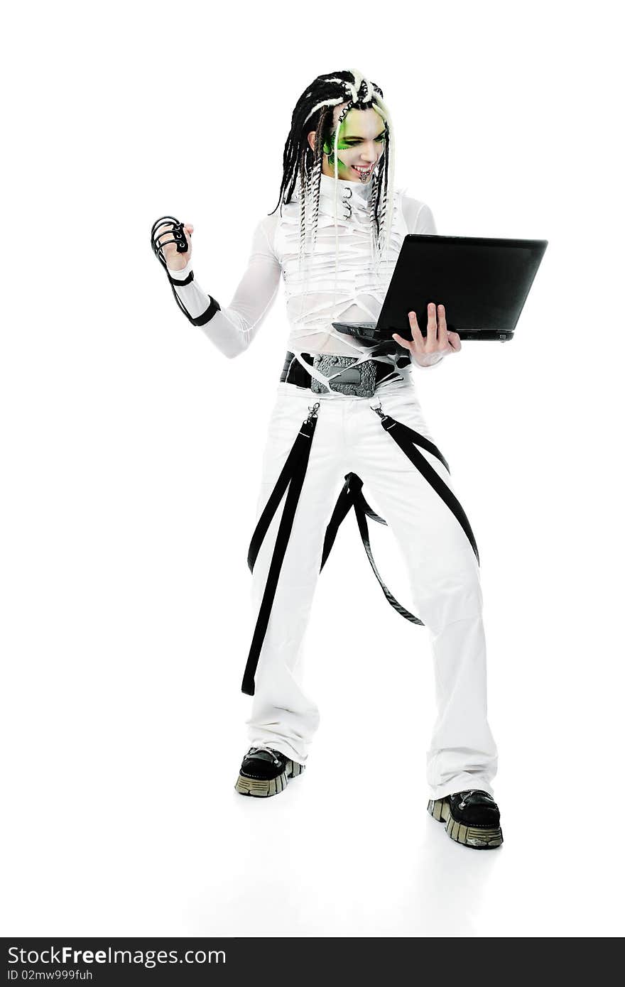 Shot of a futuristic young man with wires holding a laptop. Isolated over white background. Shot of a futuristic young man with wires holding a laptop. Isolated over white background.