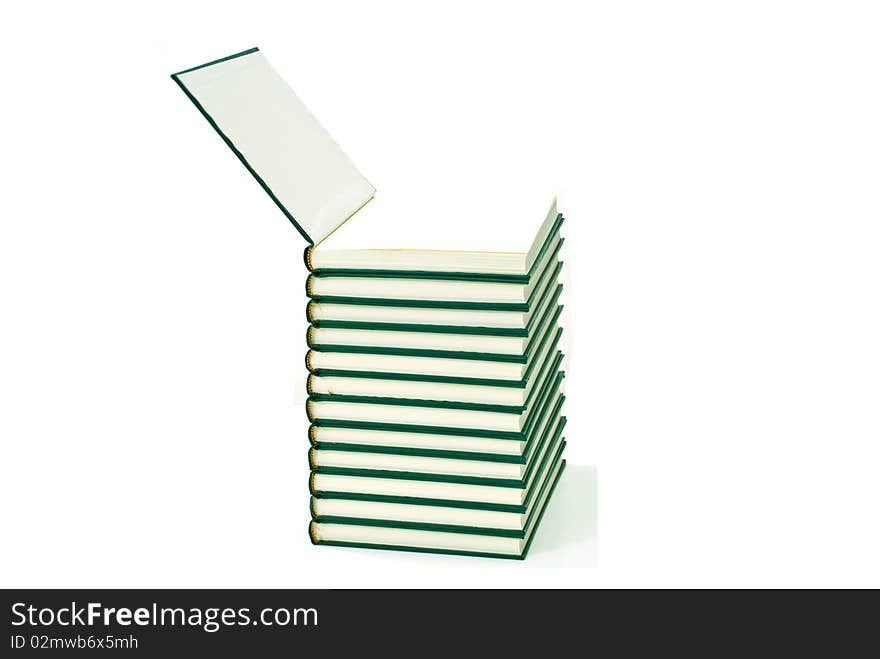 Green books closeup isolated on white background