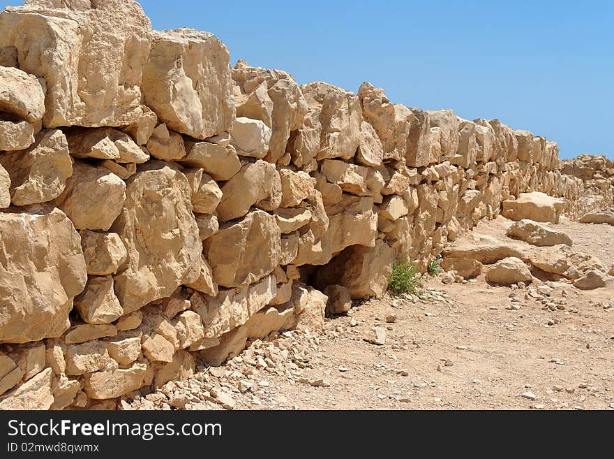 Broken wall of ancient fortress