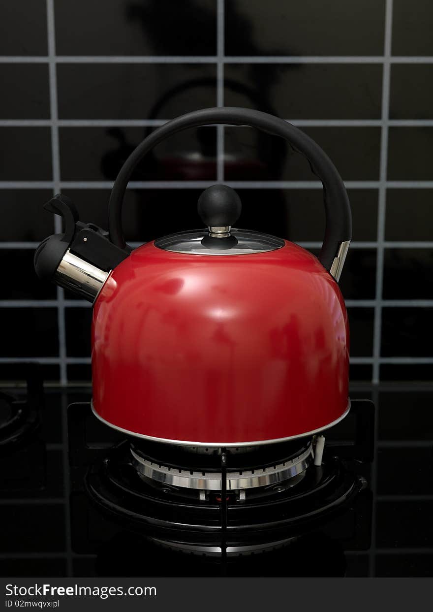 A stove top kettle on a stove top