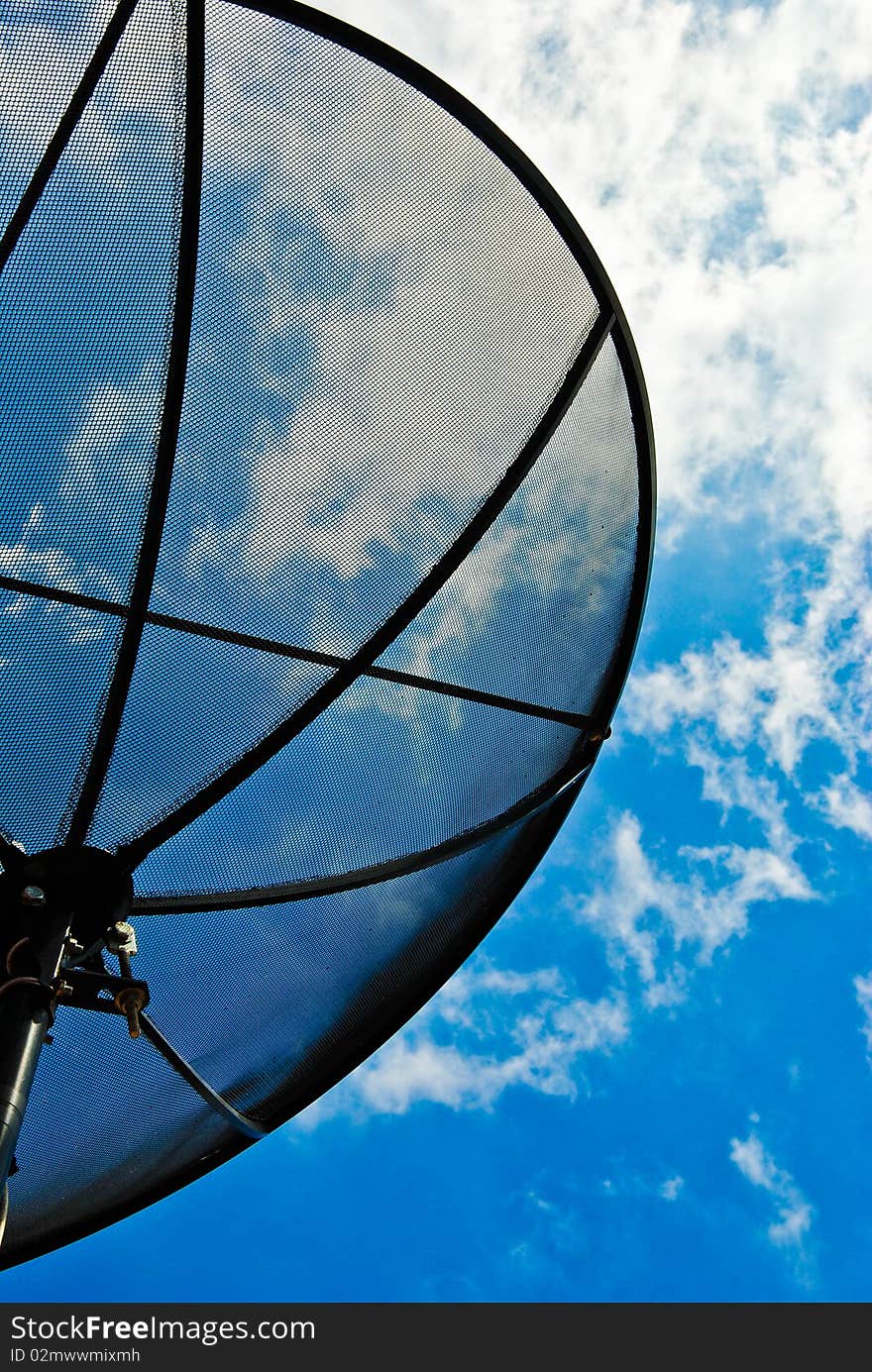 Satellite dishes on the house in the sun