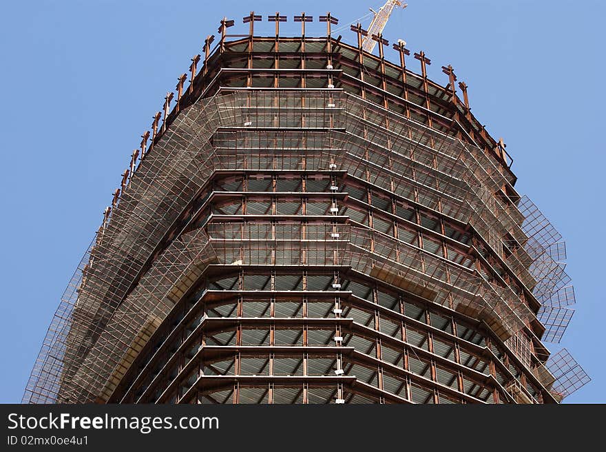 Concrete Building Construction against the blue cloudless sky