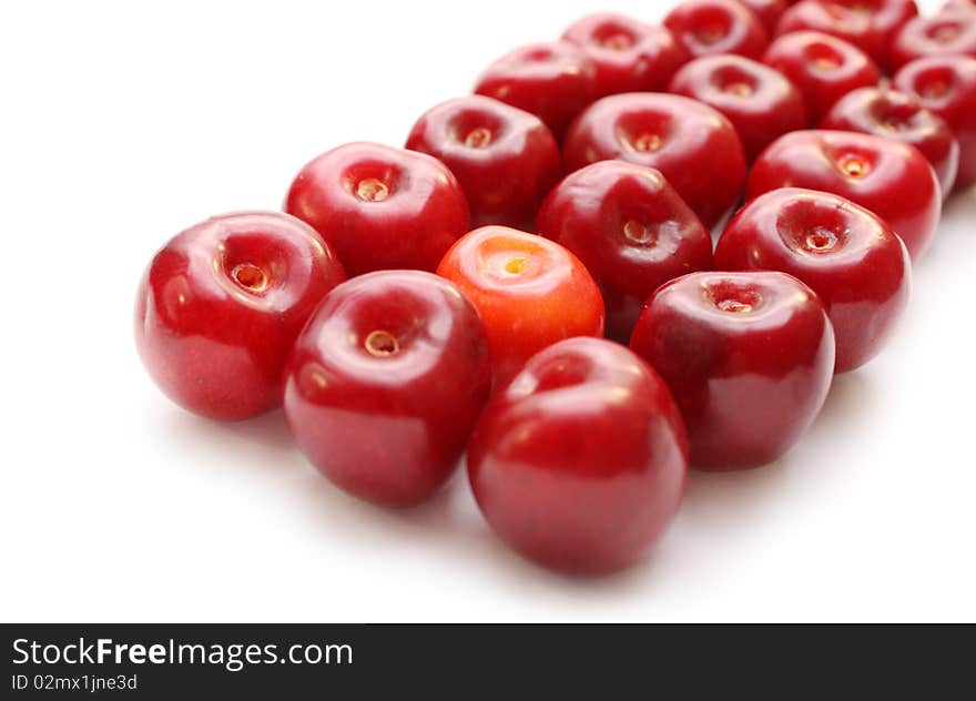 Isolated row of cherries