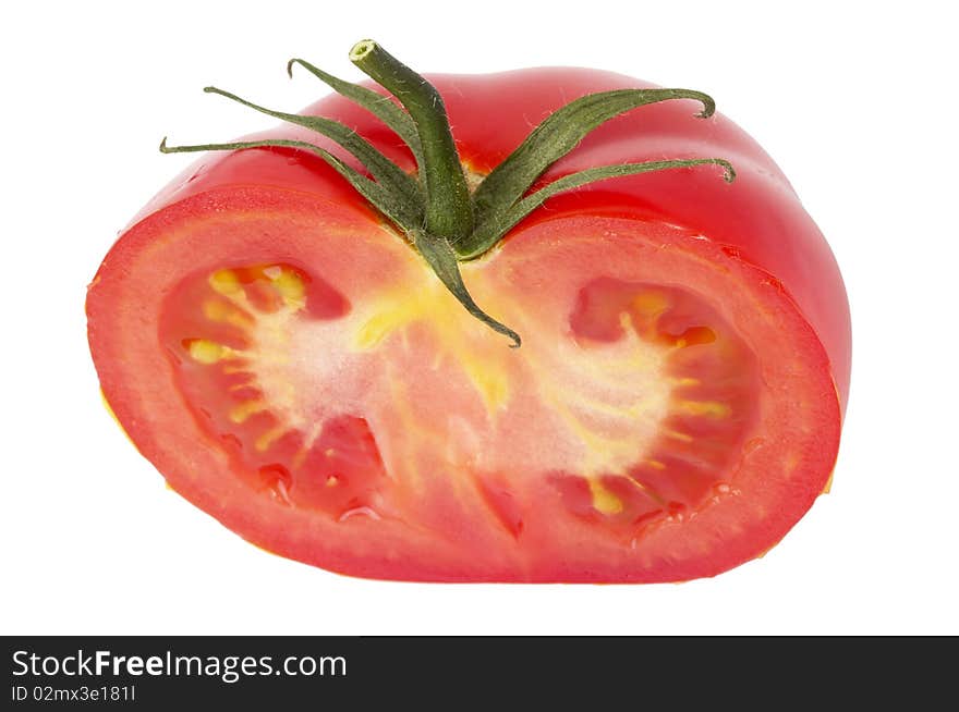 Tomato's half macro shot isolated over white background. Tomato's half macro shot isolated over white background