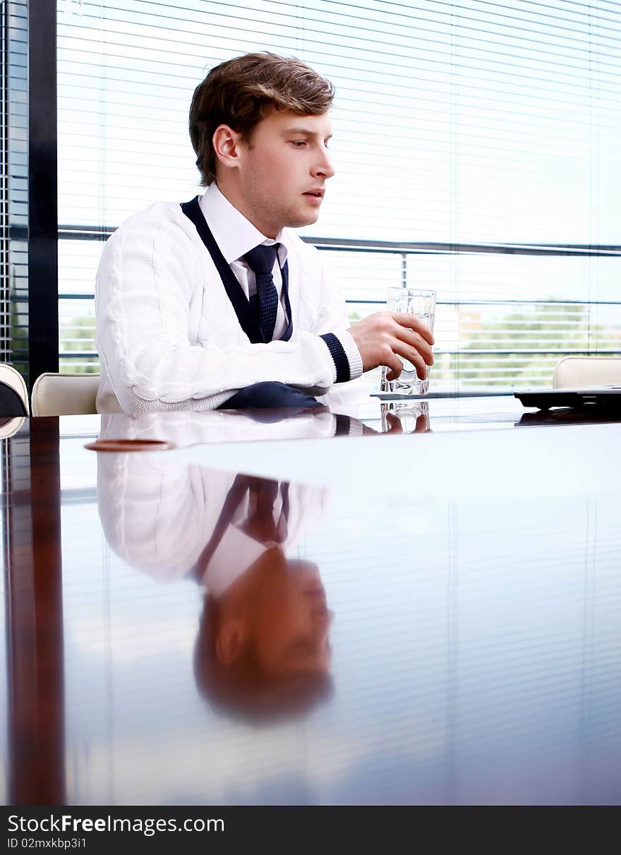 Happy business man in the office