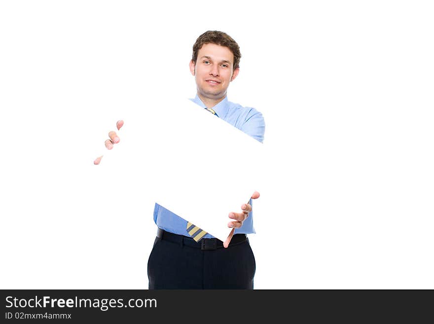 Young attractive businessman holds emty, blank copyspace card, studio shoot isolated on white background. Young attractive businessman holds emty, blank copyspace card, studio shoot isolated on white background