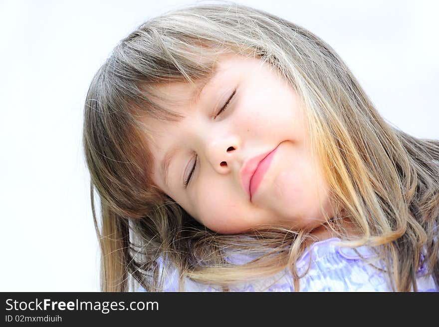 Cute little girl posing in studio