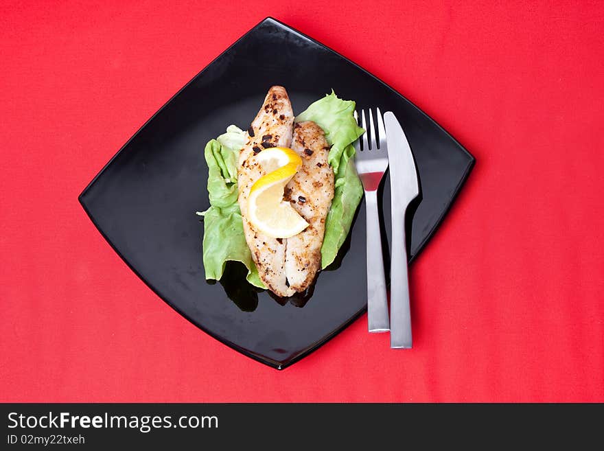 Grilled fish with fresh lemon juice