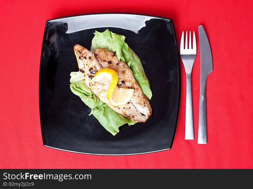 Grilled fish with fresh lemon juice