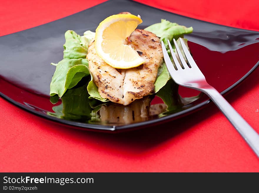 Grilled fish with fresh lemon juice